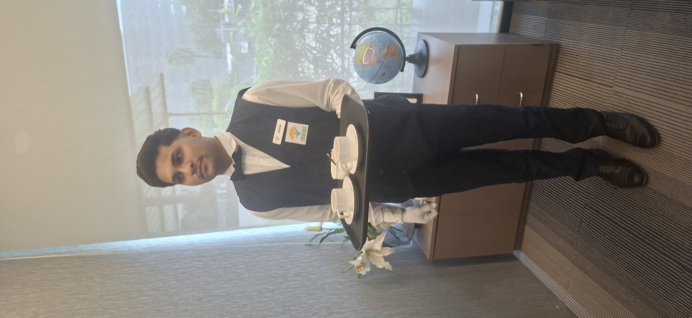 DFMS pantry service professional Akash serving beverages